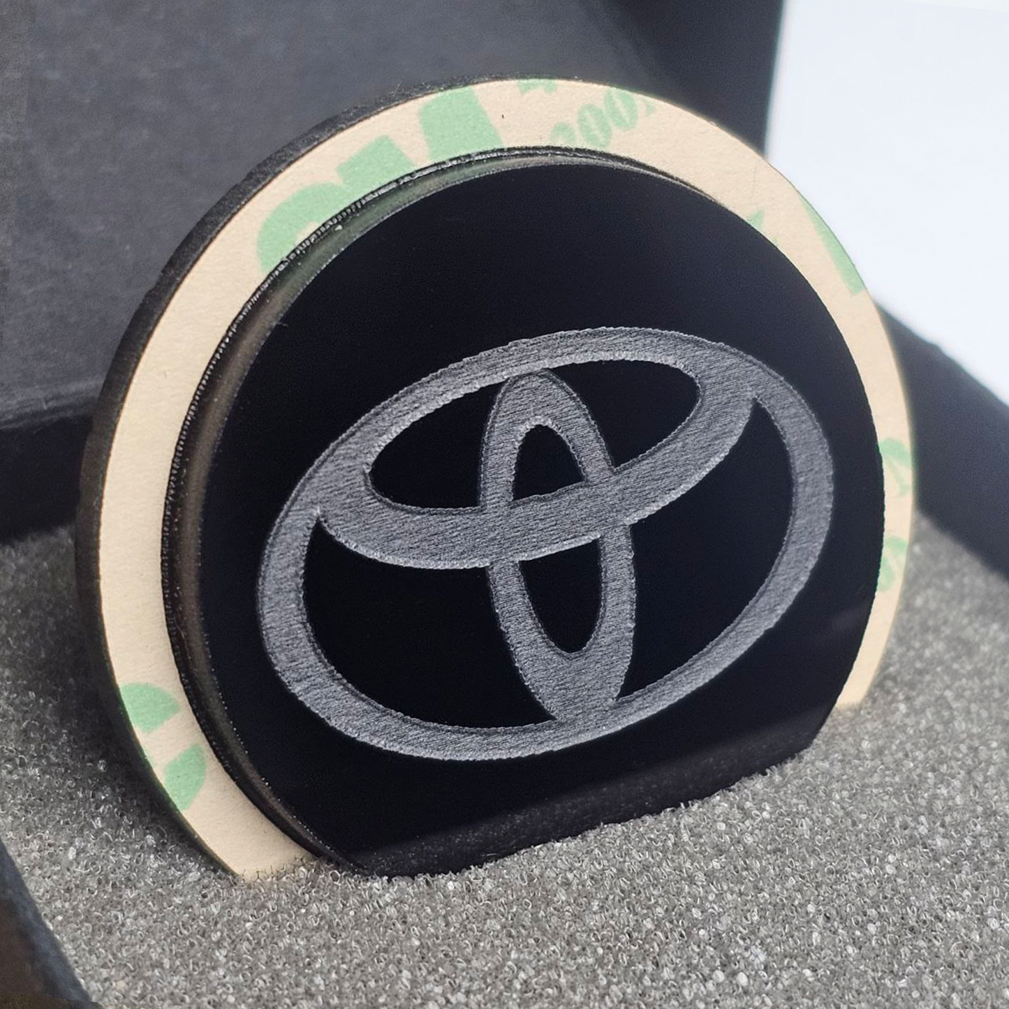 Tapón anulalimpia trasero Toyota - Logo