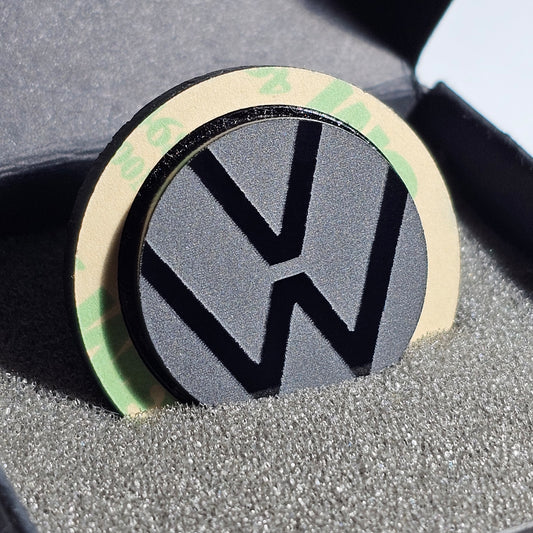 Tampa supressora do limpador traseiro VAG - Volkswagen Logo 2